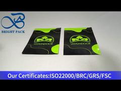 緑と黒の小さなプラスチックスタンドアップジップロックバッグ