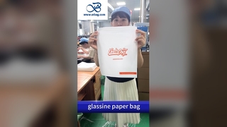 生態に配慮したブランドのための自己粘着用ストライプ付きの生分解性ガラス製紙袋40g