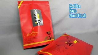 紅茶用の赤い自立型ジップロックバッグ